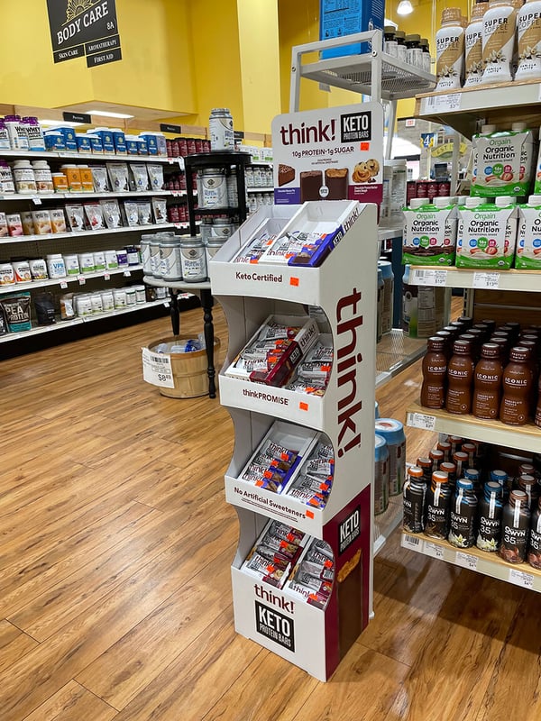 angled-shelf-floor-display-with-product-trays