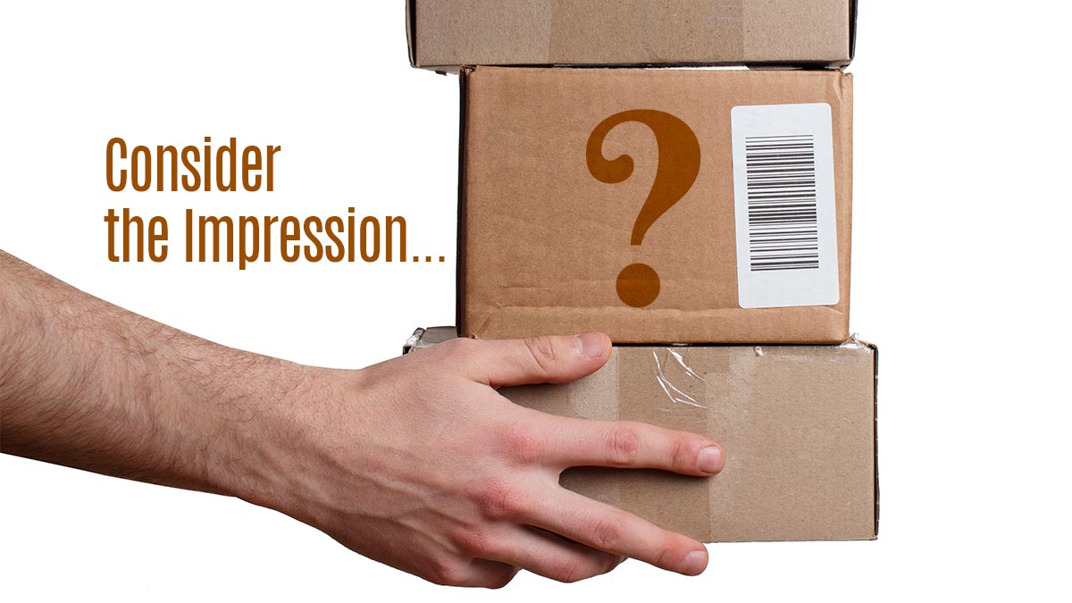 consider-impression-stack-cardboard-boxes-mens-hand