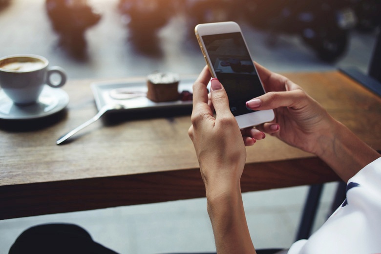 woman-coffeshop-phone